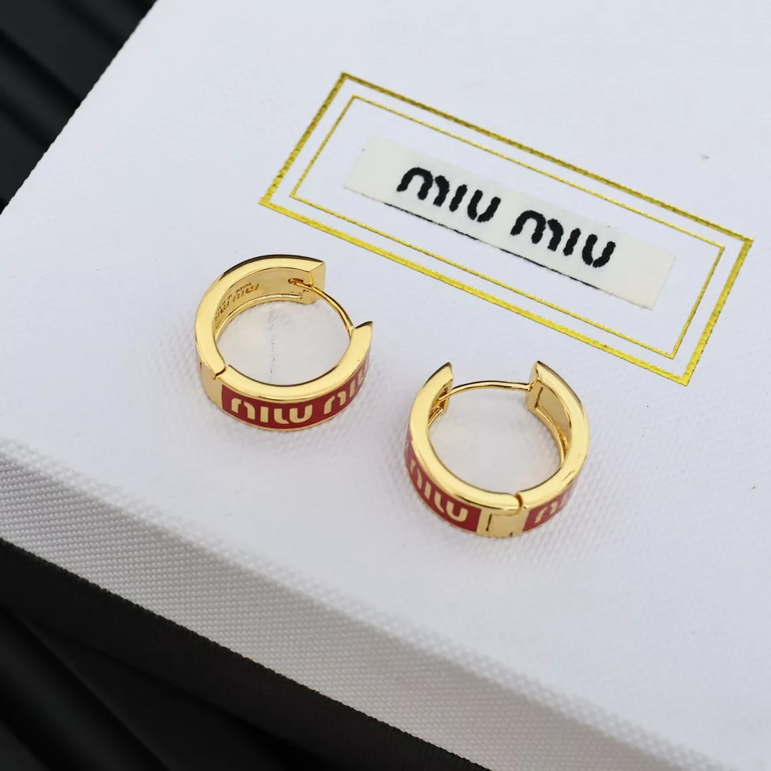 miu miu boucles doreilles pour femme s_12b03004